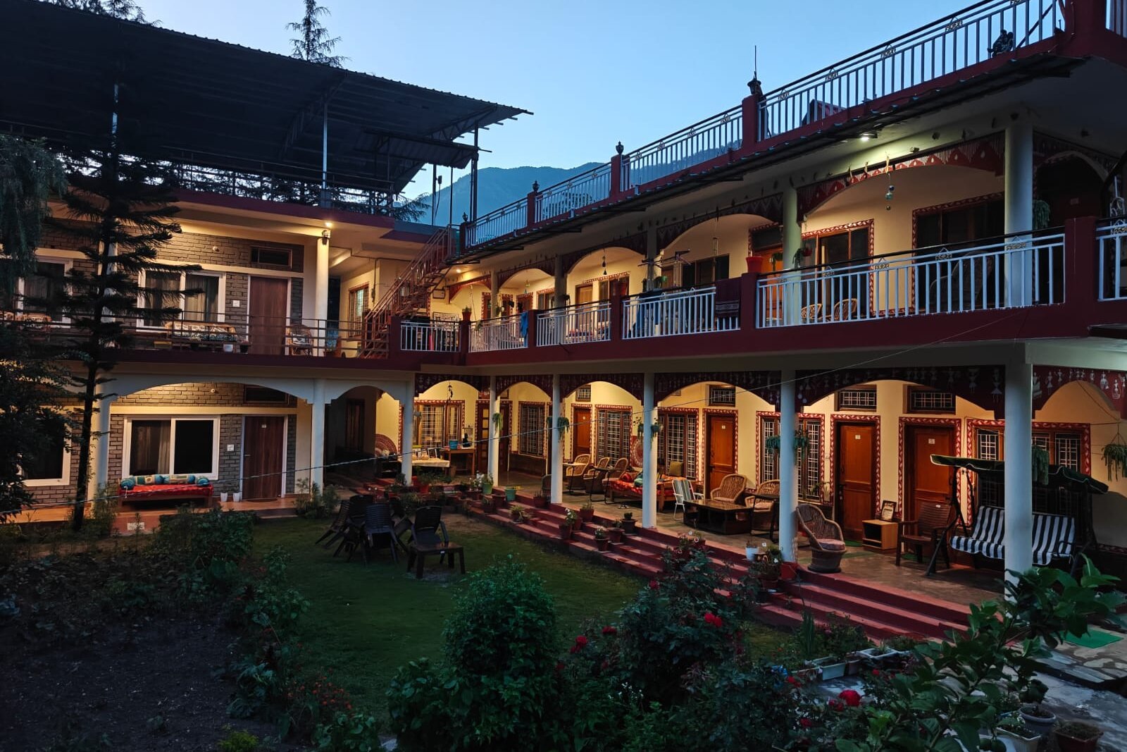 The Uttarkashi residential campus and garden at dusk
