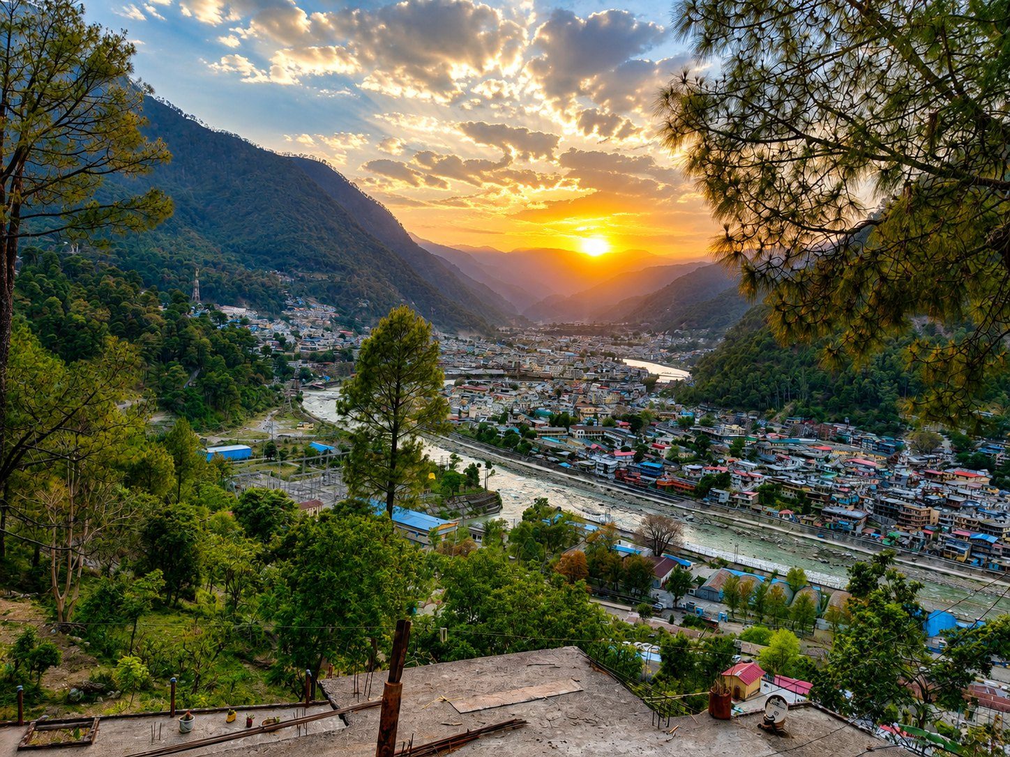 Sunset over the Uttarkashi valley, with the Bhagirathi River running through the town below